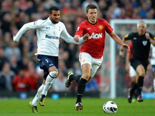 Sandro and Carrick chase the ball in their match-up last season